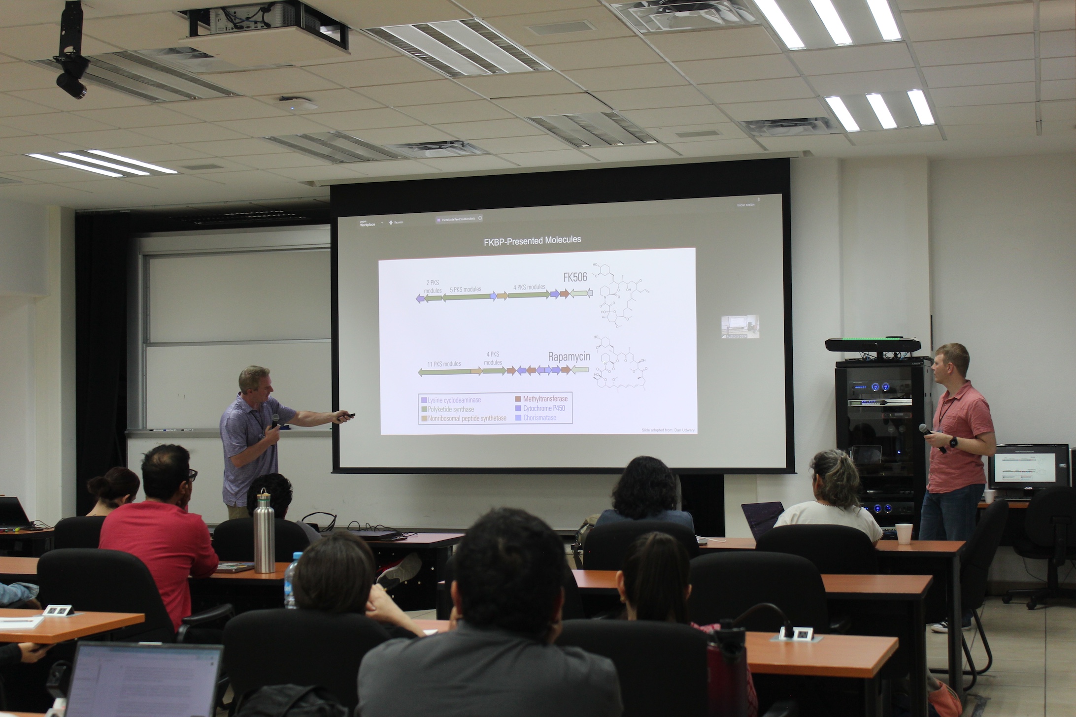 Photograph of Marc Chevrette and Reed Stubbendieck Presenting a Lecture on Natural Product Biosynthesis